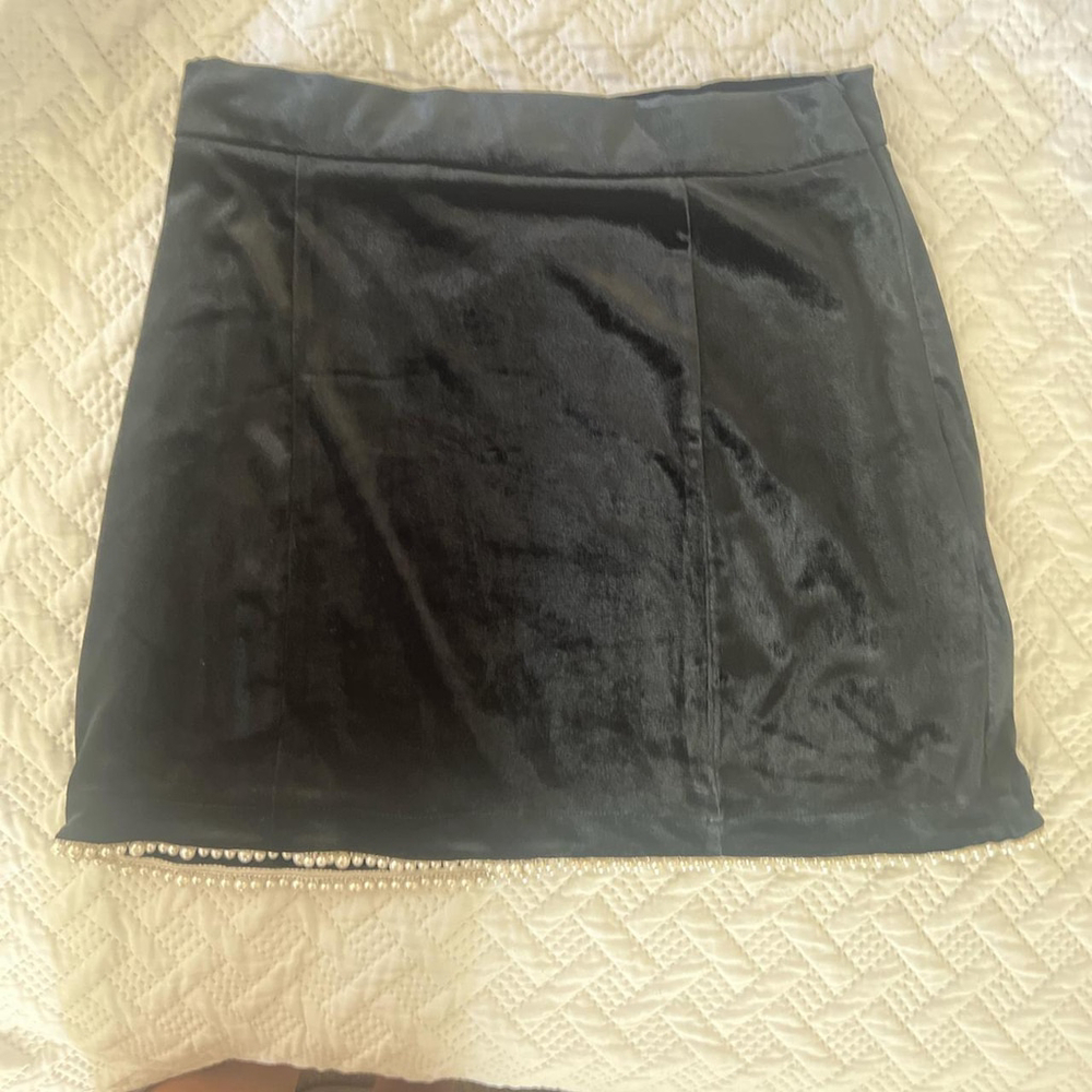 Black velvet mini skirt with pearl trim